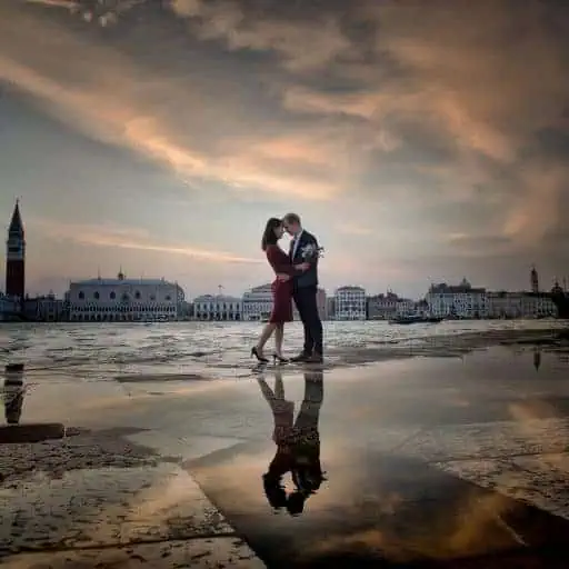 A couple during a symbolic wedding in Venice captured at the iconic San Giorgio Maggiore island.