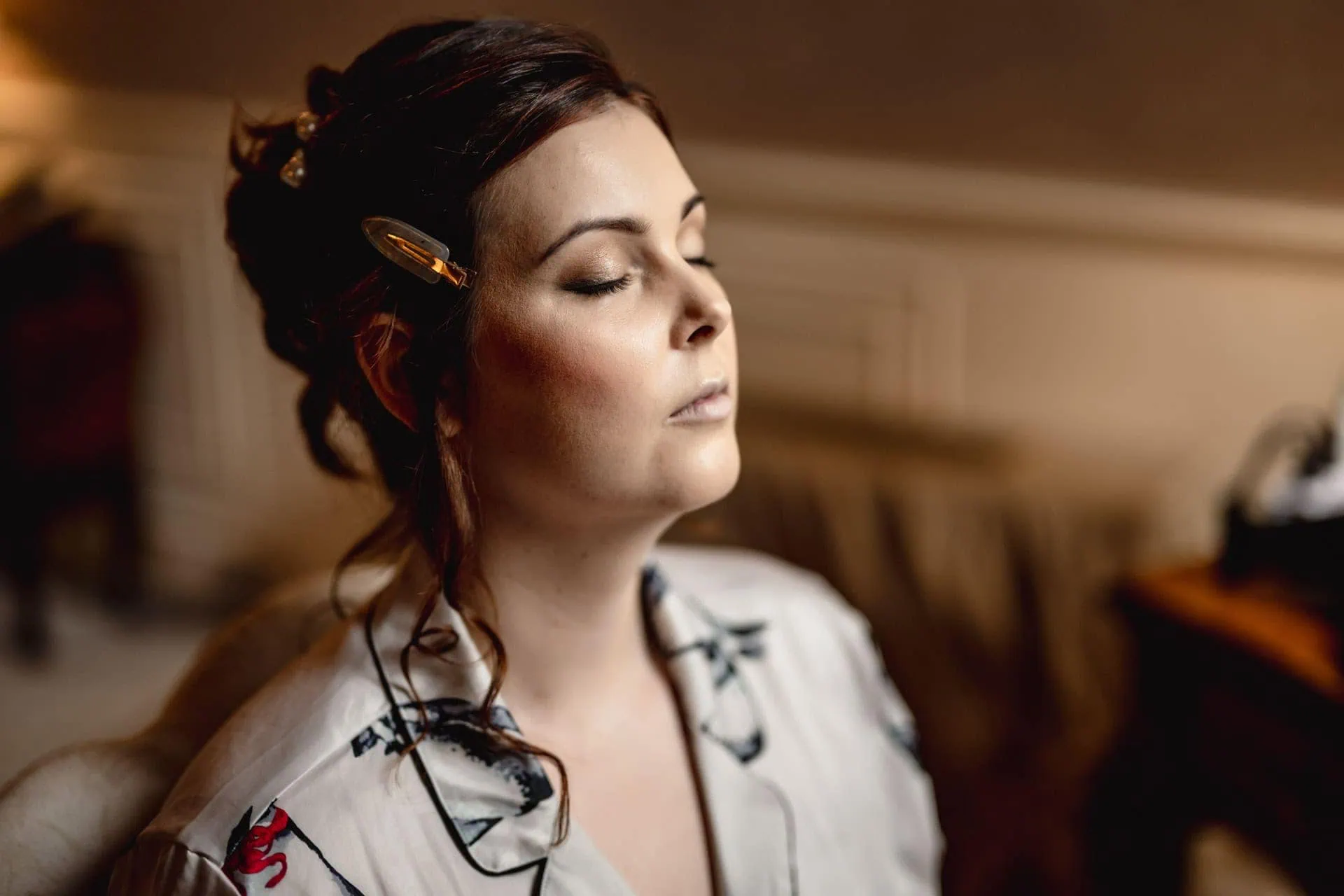Bride getting ready in luxurious Ca’ Sagredo suite for Venice elopement