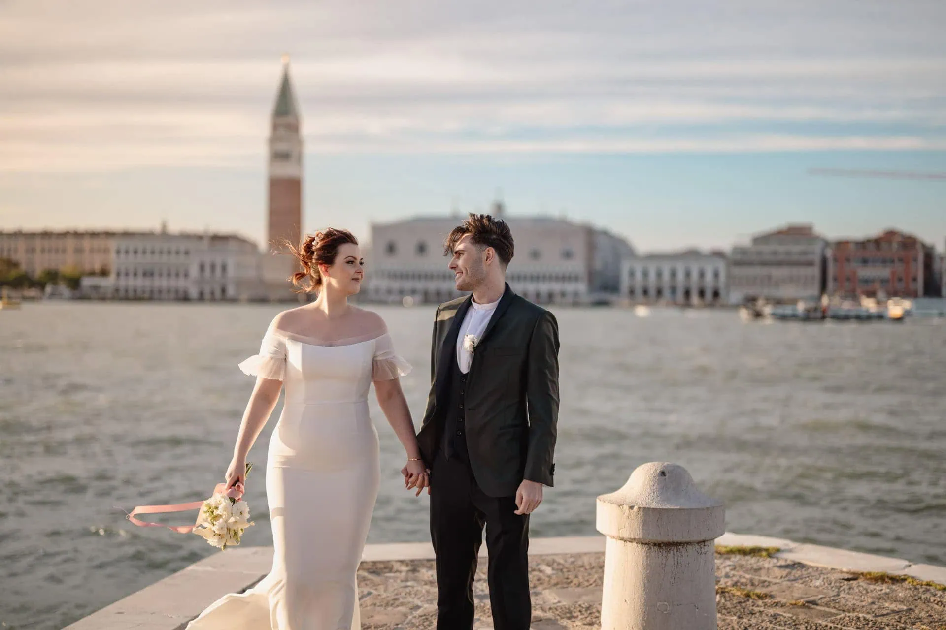 Couple at San Giorgio Maggiore with panoramic view of Venice lagoon