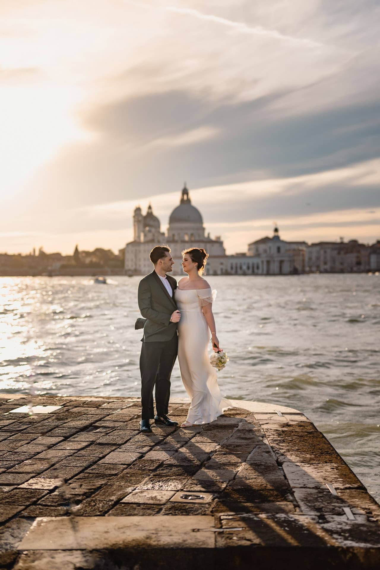 Couple at San Giorgio Maggiore with panoramic view of Venice lagoon