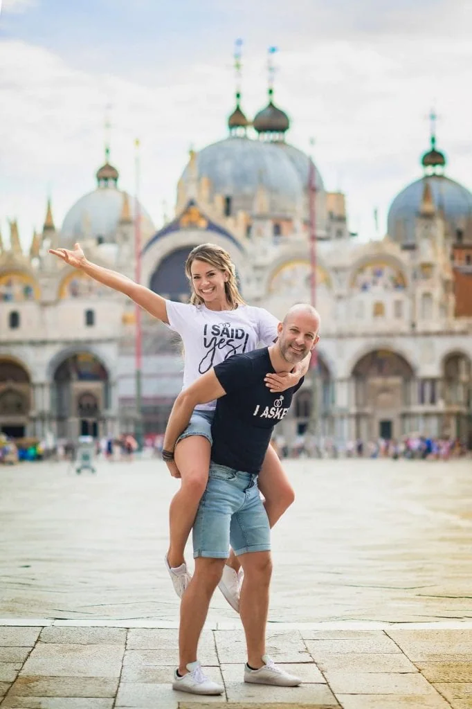 Romantic proposal at sunrise in Piazza San Marco, one of the best places to propose in Venice.