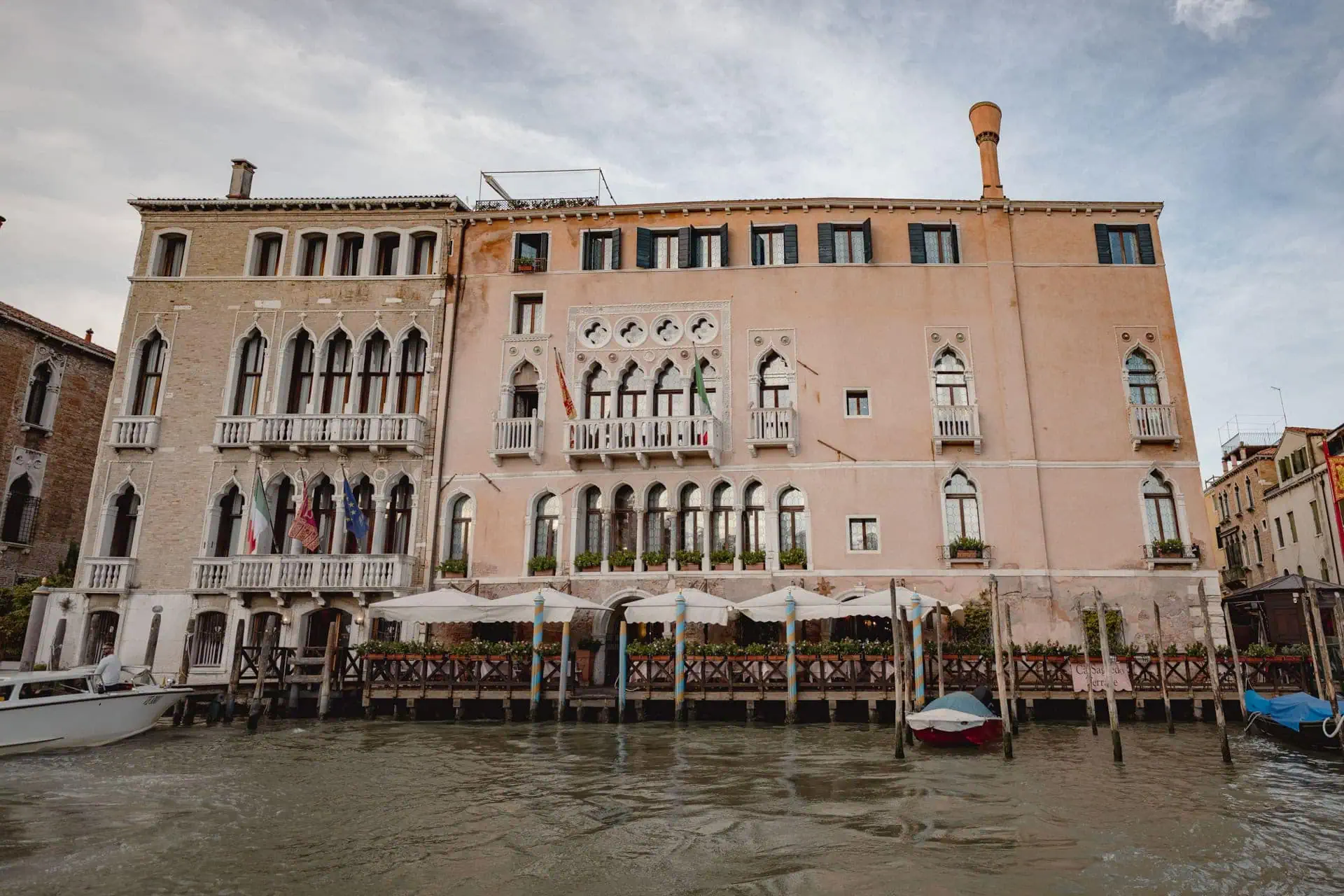 front of Ca’ Sagredo Hotel for symbolic elopement in Venice