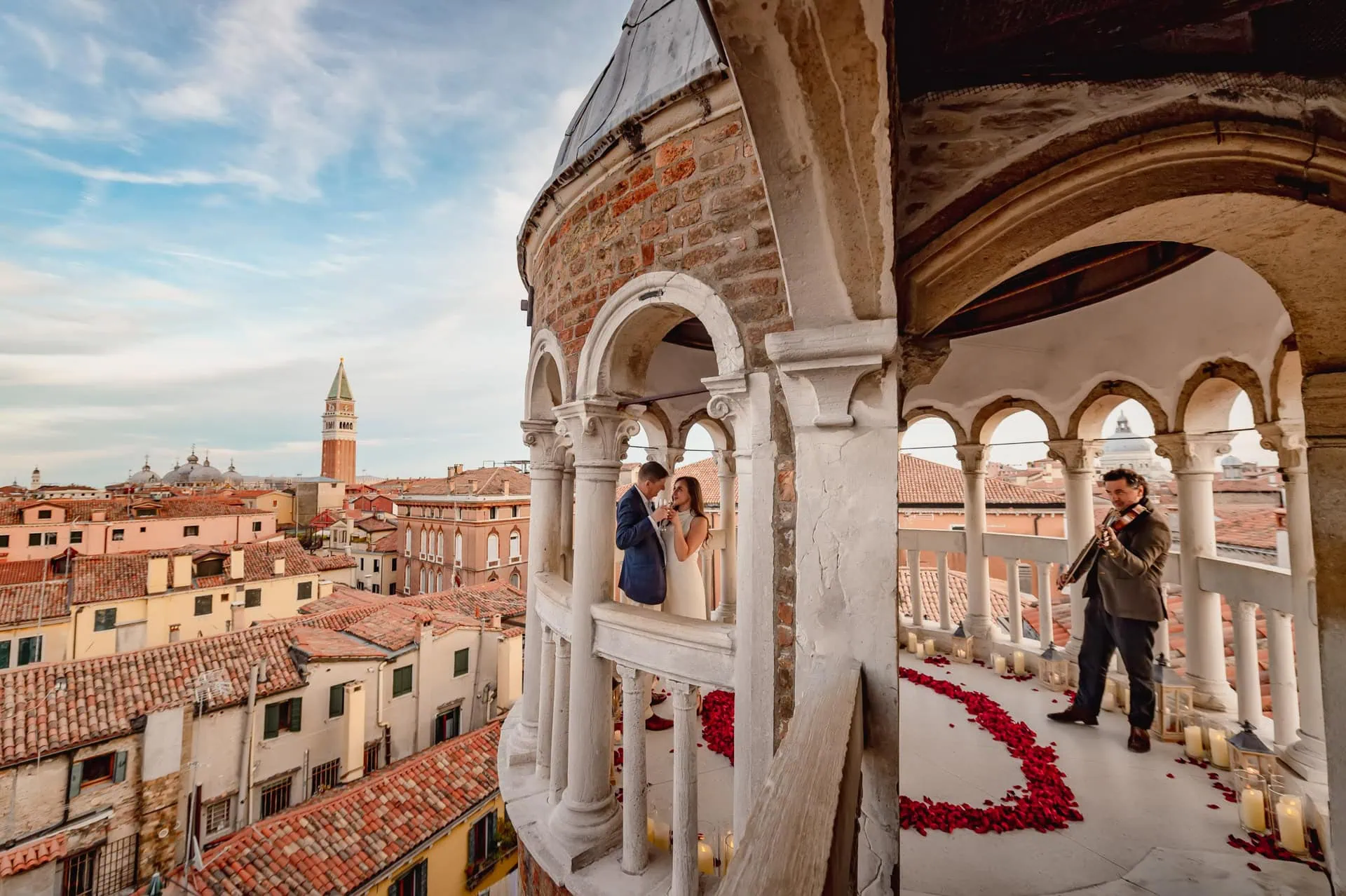 Couple laughing and walking hand in hand along a quiet Venetian alley – Candid engagement photos in Venice.