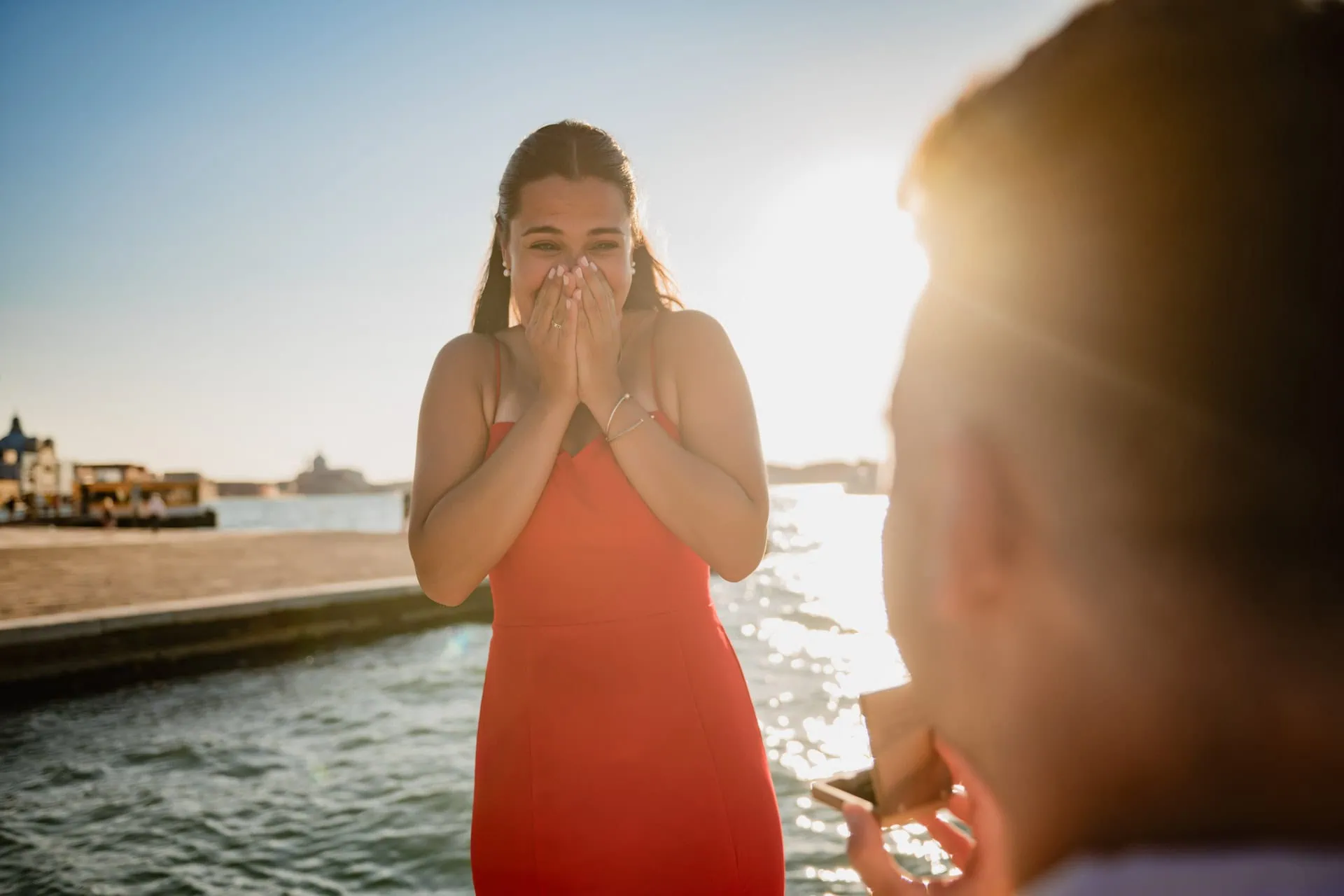 Surprise proposal on a gondola under the Bridge of Sighs – Venice engagement photography.