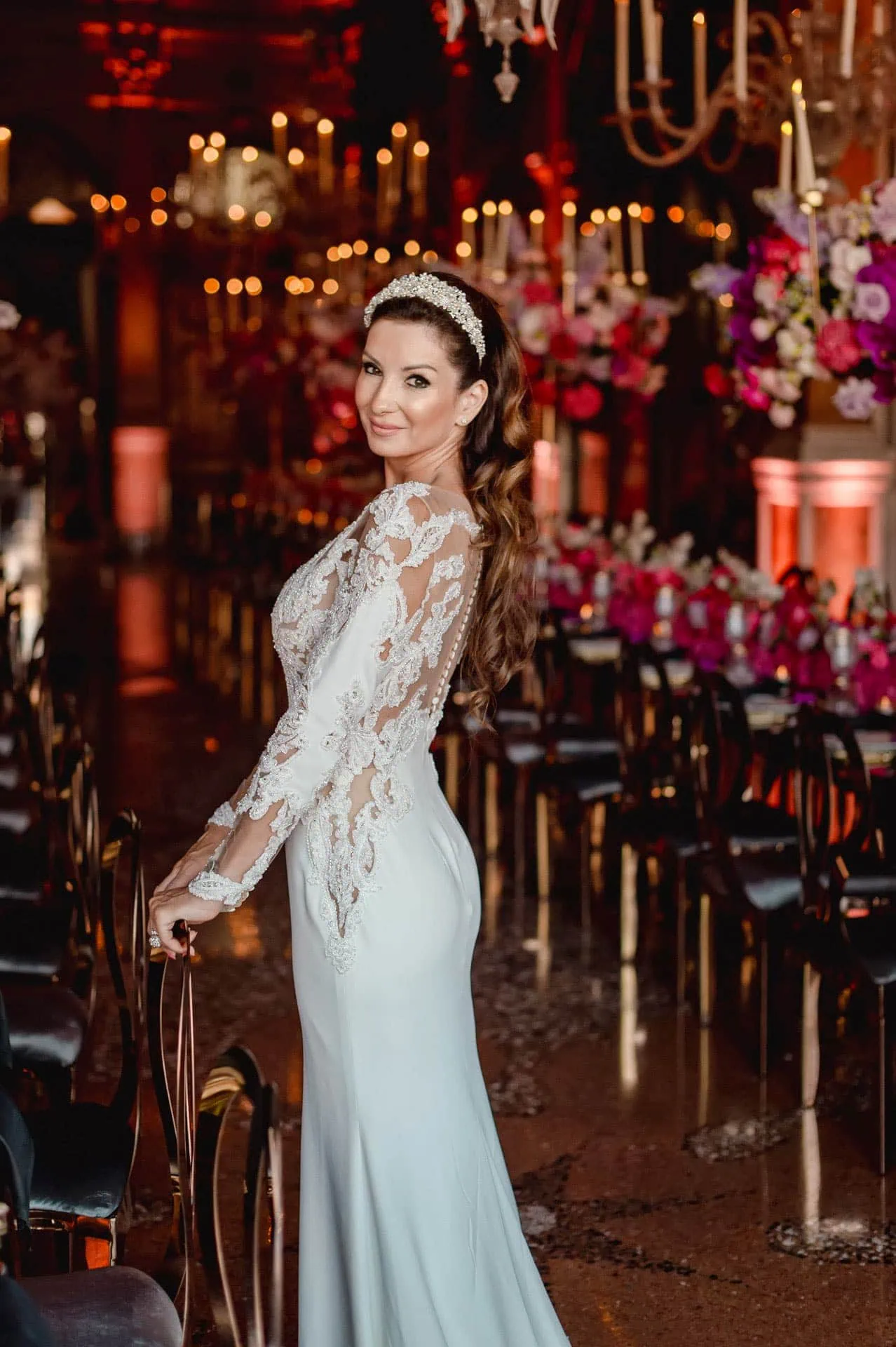 A bride posing elegantly inside the historic Pisani Moretta Palace in Venice – wedding photography Venice.