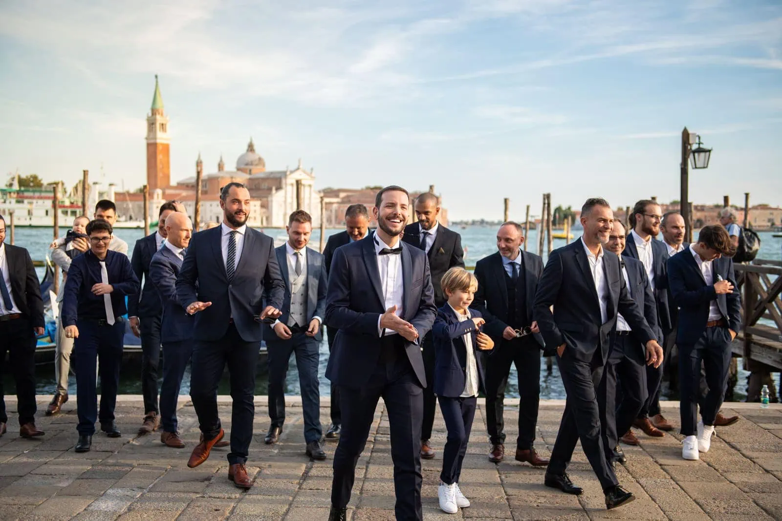 Stylish guest attire in Venice for a formal wedding.