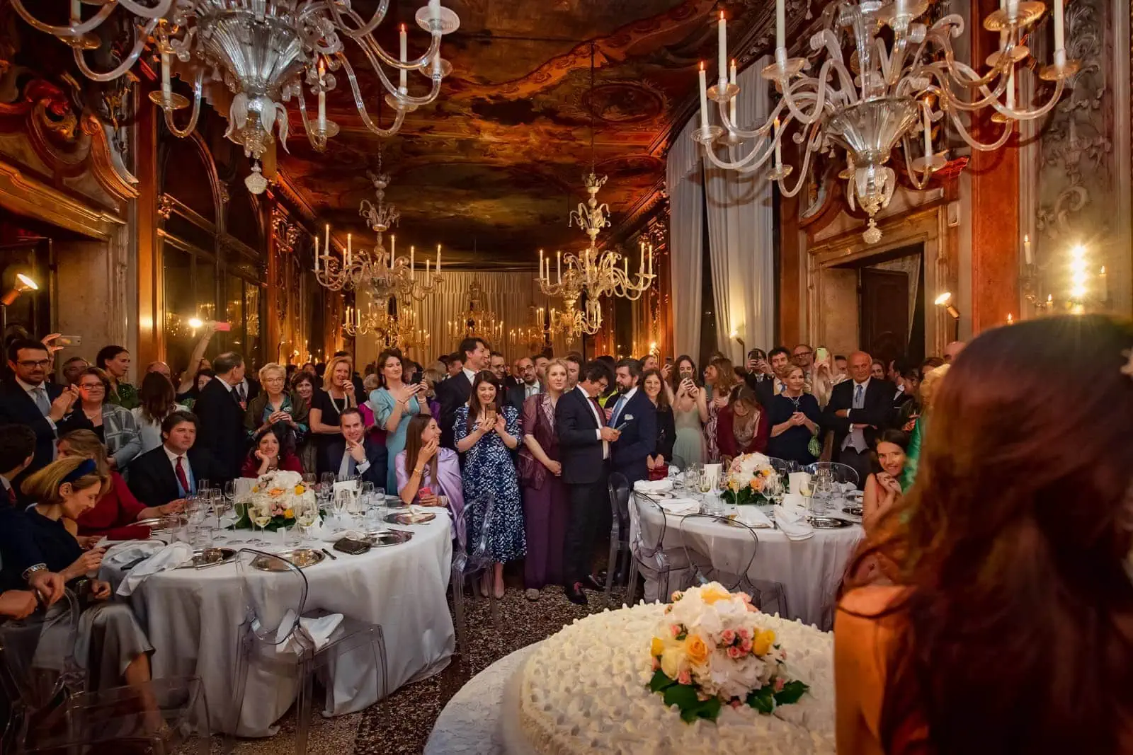 Stylish guest attire in Venice for a formal wedding.