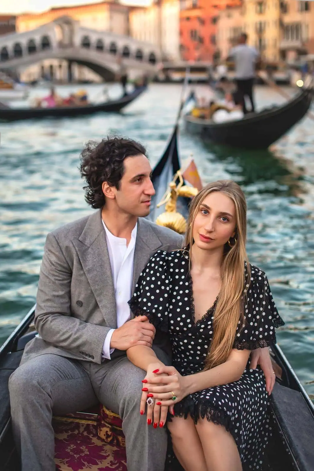 Stylish guest attire in Venice for a formal wedding.