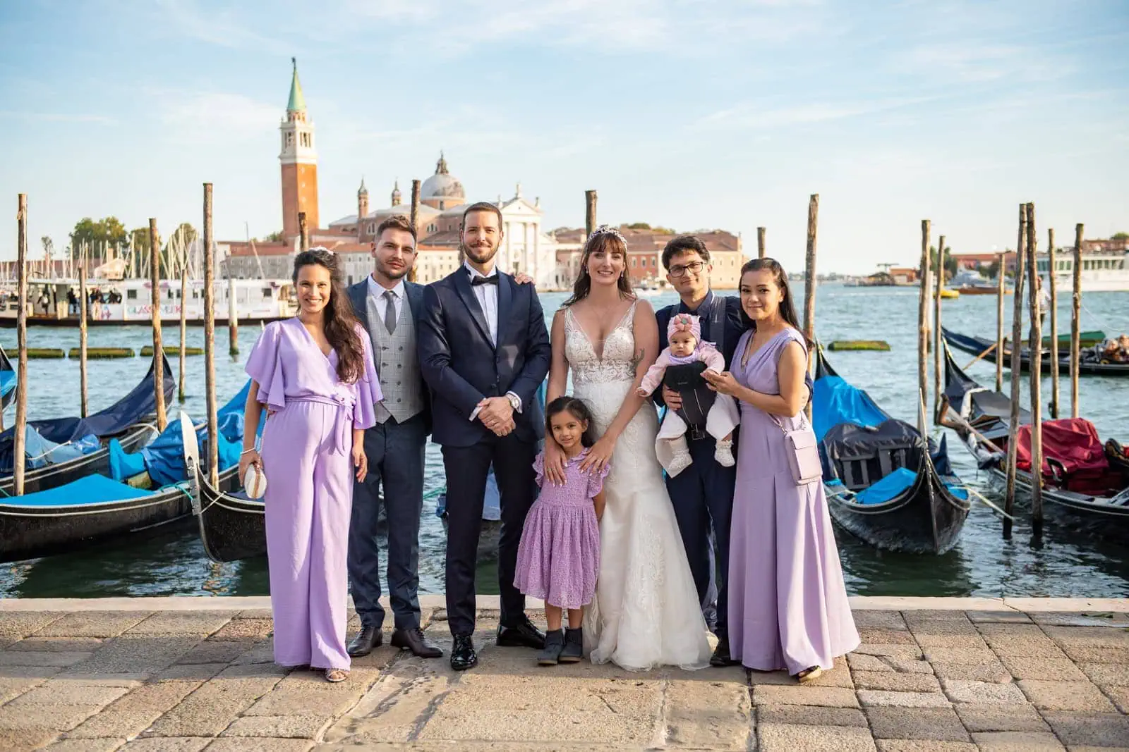 Stylish guest attire in Venice for a formal wedding.