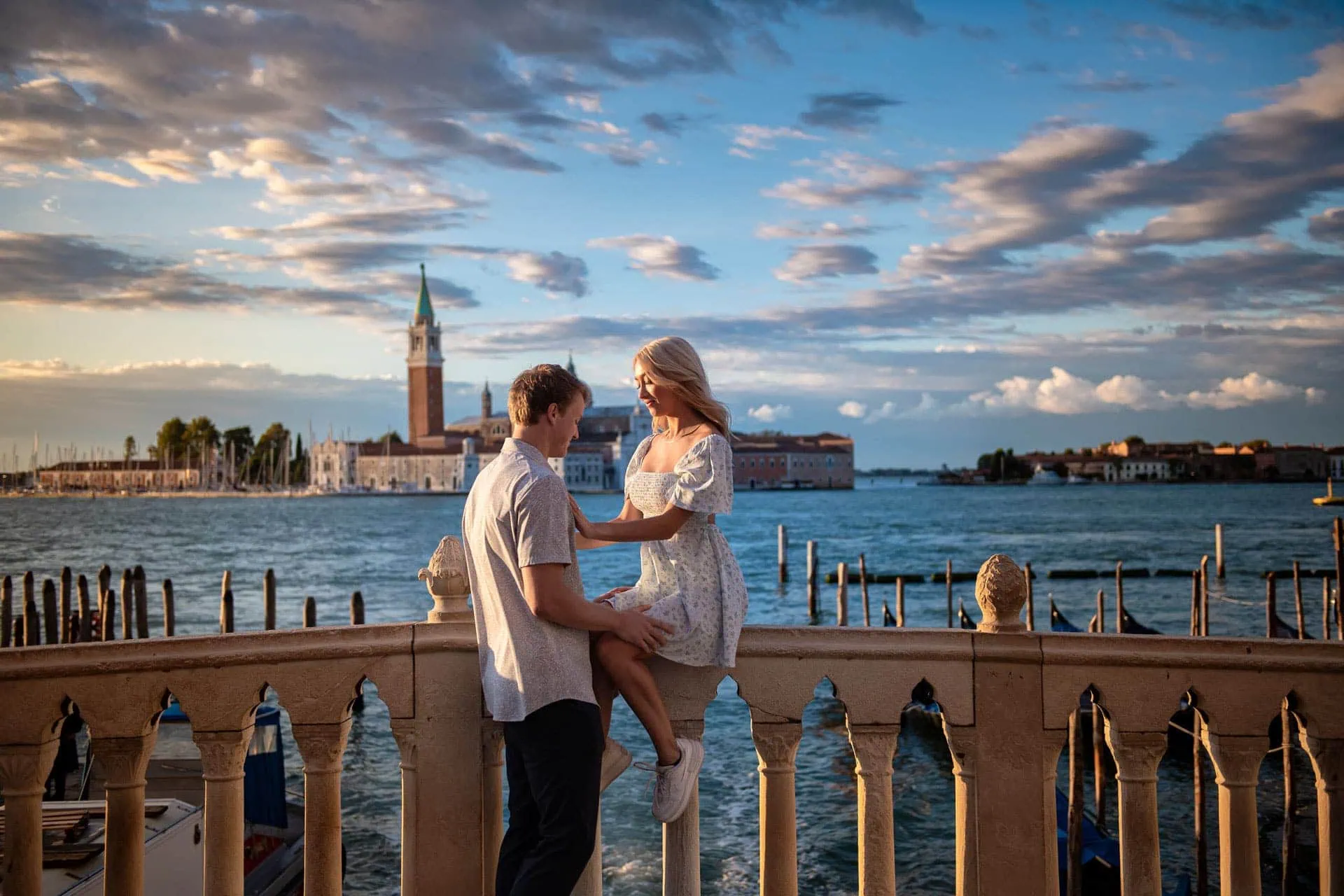 Couple during their engagement photoshoot at Piazza San Marco at sunrise, showcasing the best proposal Venice experience