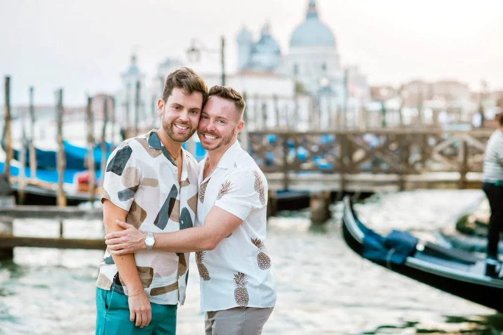 Romantic lgtb marriage proposal overlooking the Grand Canal, one of the best proposal Venice locations.