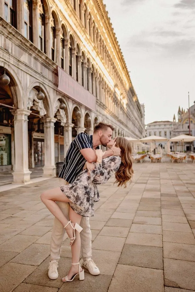 Couple during their photoshoot for their Venice best proposal in front of the Basilica San Marco.