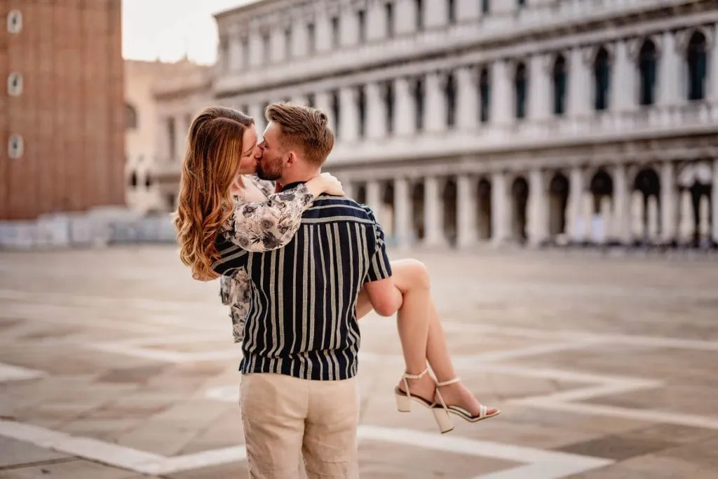 Couple during their photoshoot for their Venice best proposal in front of the Basilica San Marco.