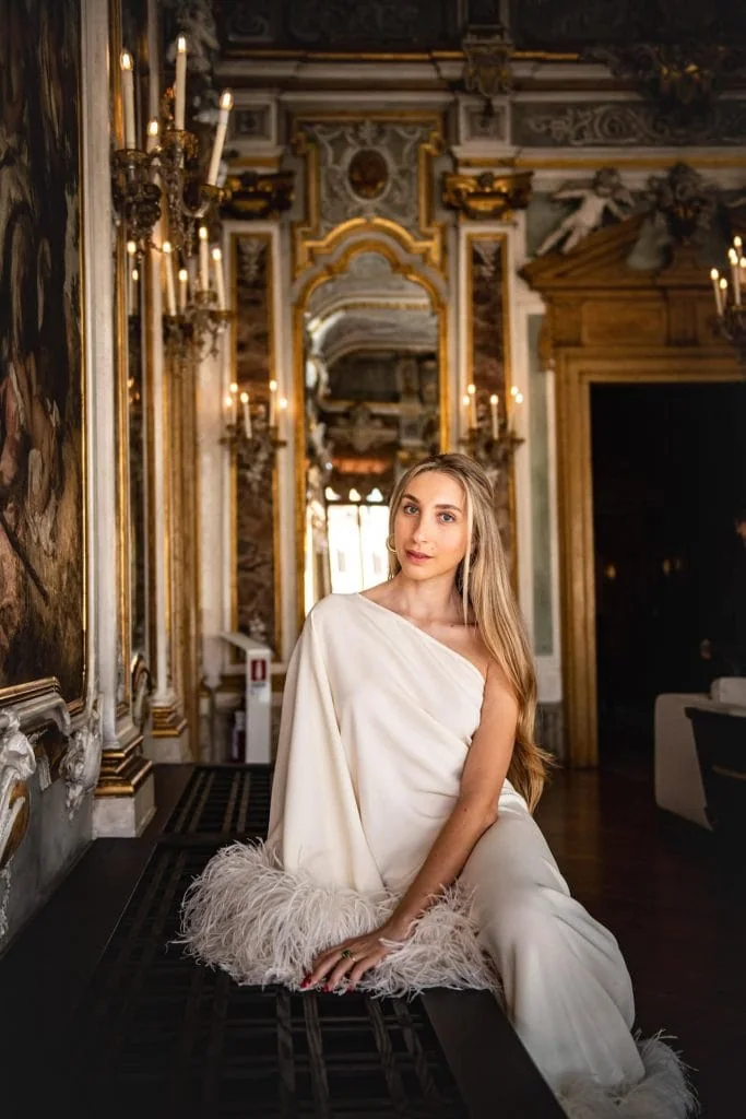 Elegant bride looking at the sunset over the Grand Canal – Magical Venice elopement moment.