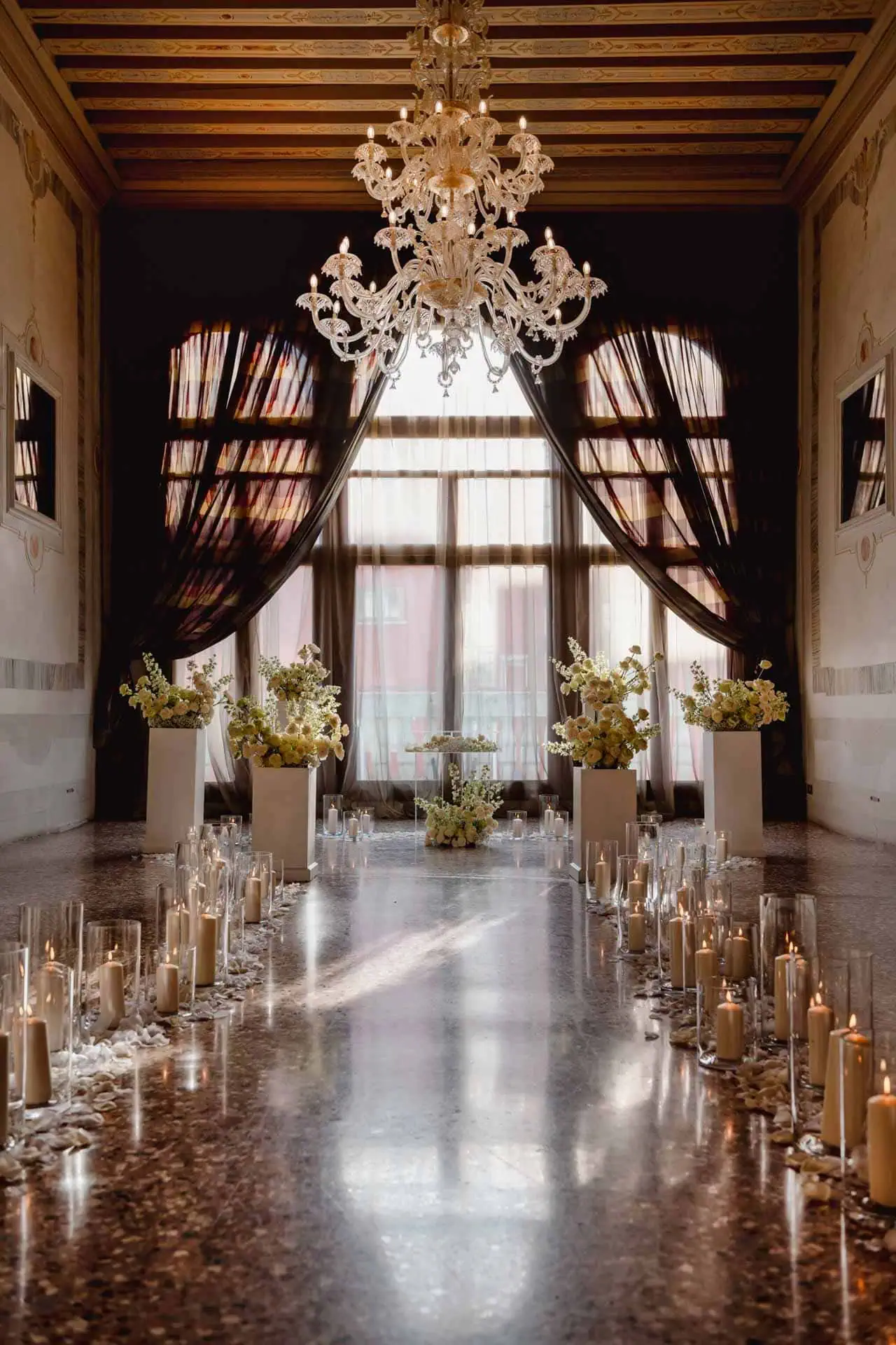 A couple during a symbolic wedding in Venice captured inside a luxurious private palace, surrounded by elegant decor.