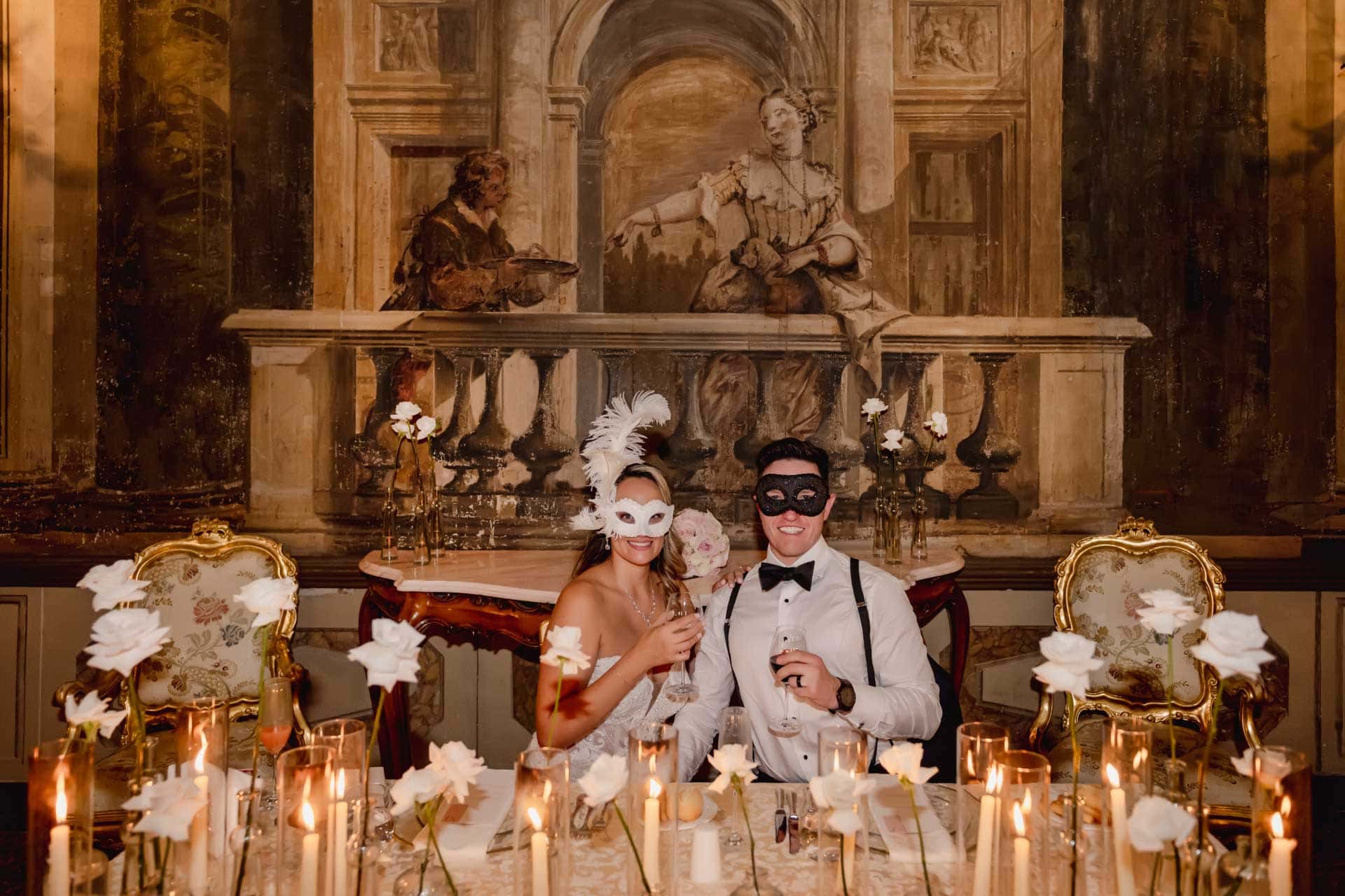 Bride and groom perform their first dance under the chandeliers of the Sala della Musica.