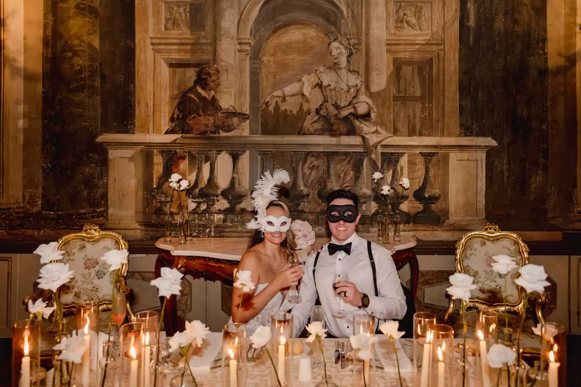 Bride and groom perform their first dance under the chandeliers of the Sala della Musica.
