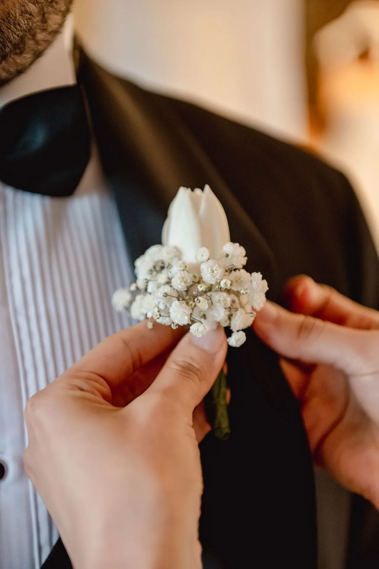 A couple during a symbolic wedding in Venice captured inside a luxurious private palace, surrounded by elegant decor.