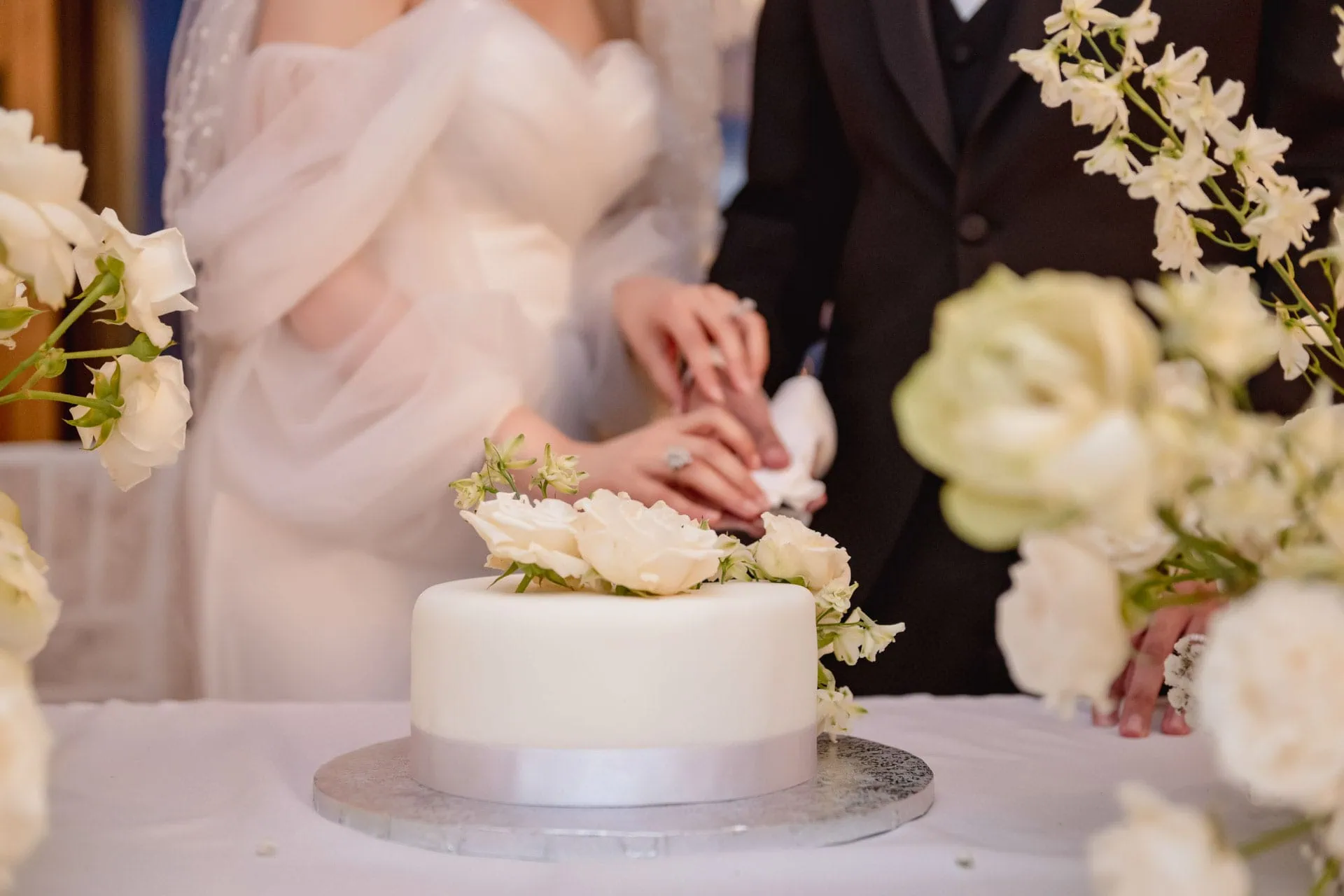 A couple during a symbolic wedding in Venice captured inside a luxurious private palace, surrounded by elegant decor.