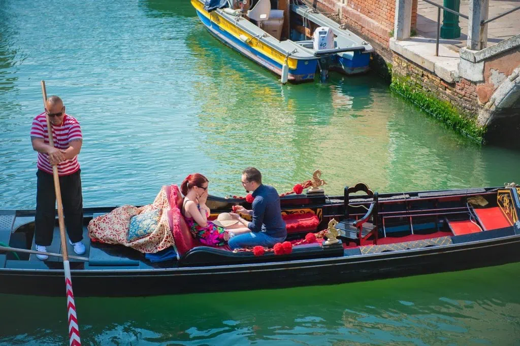 Proposal in Venice on a romantic gondola ride, captured by a Venice proposal photographer.