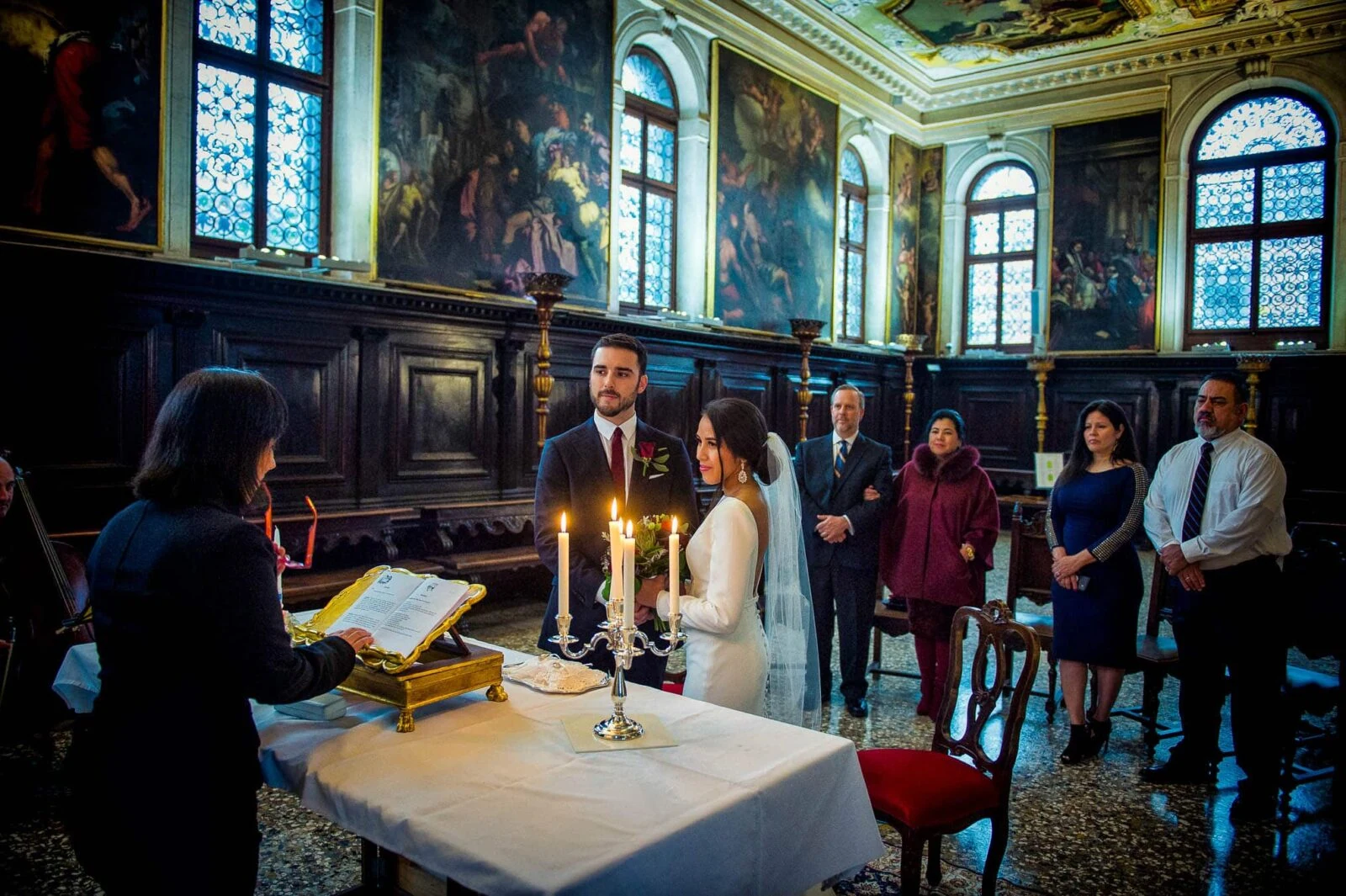 A historic wedding at Carmini Church, a Venice iconic location for wedding with Baroque architecture and Tiepolo frescoes.