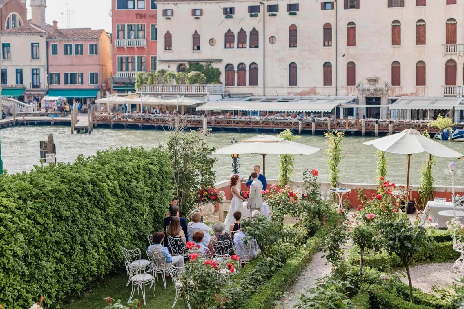 Family wedding celebration in a private Venetian garden.