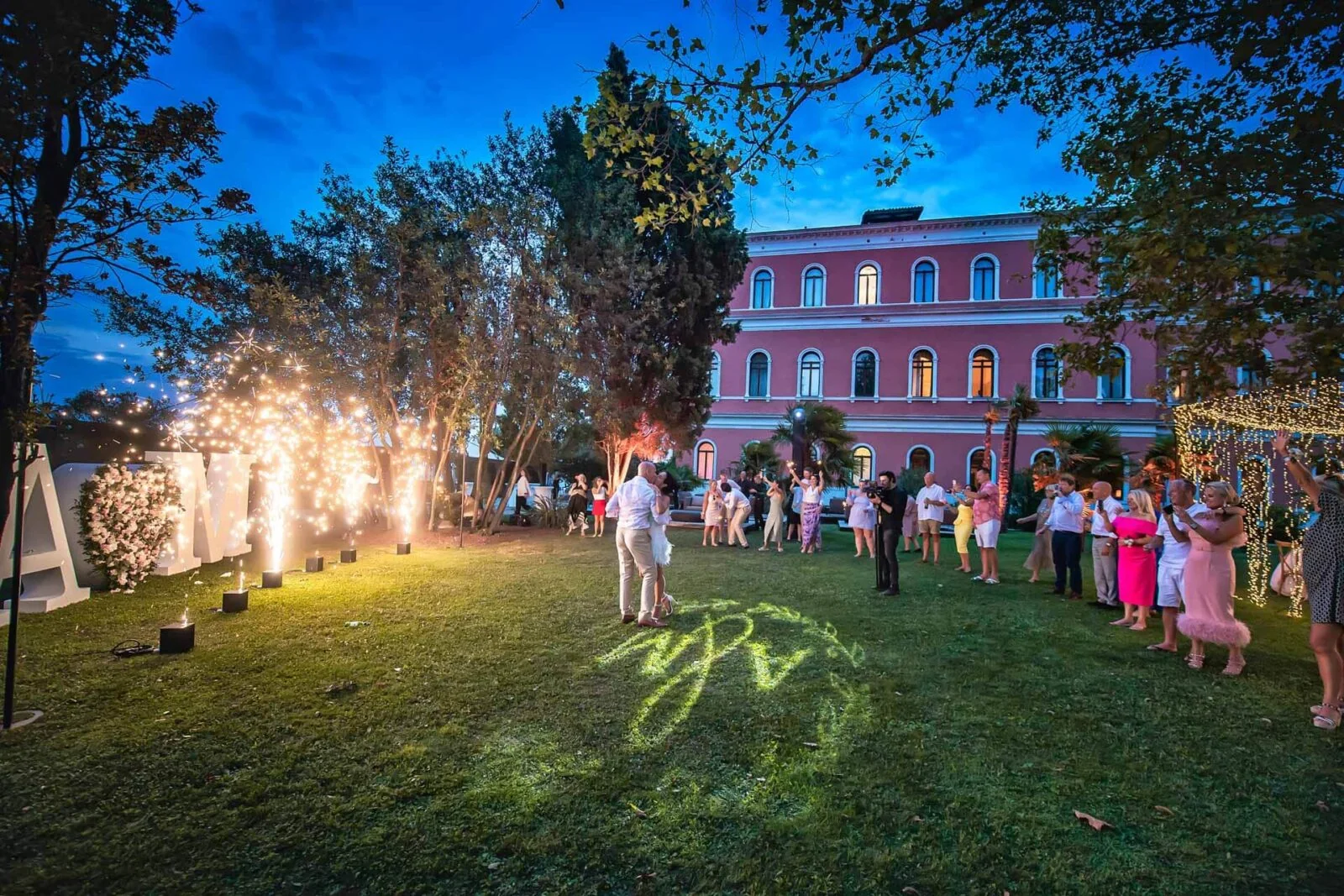 Outdoor wedding in the luxurious gardens of Kempinski Venice.