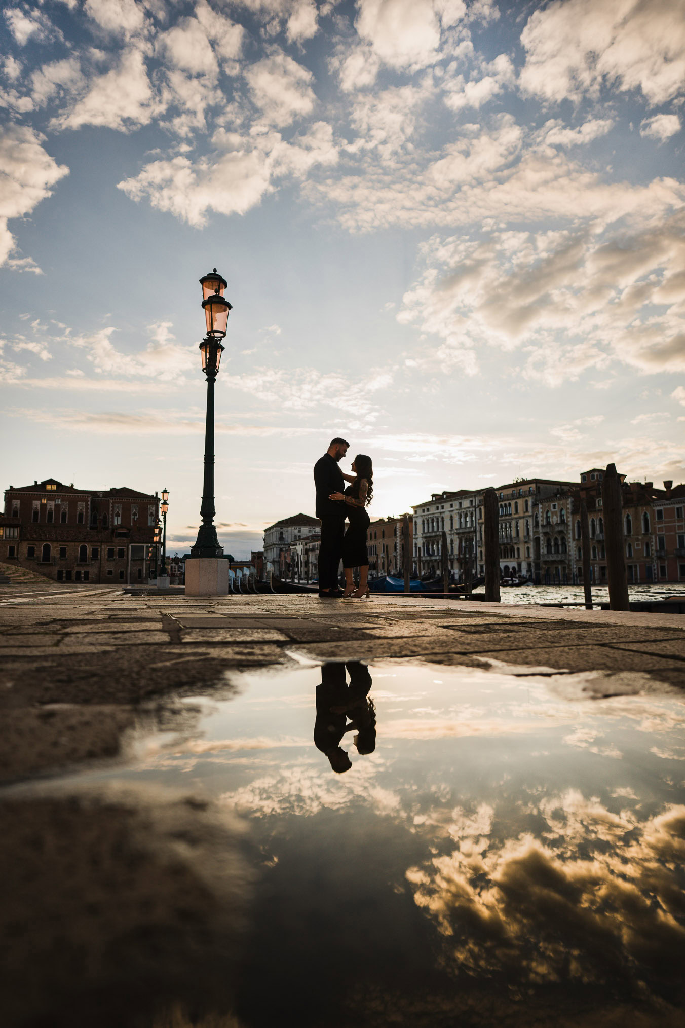 Reflection photo with Salute church behind the couple
