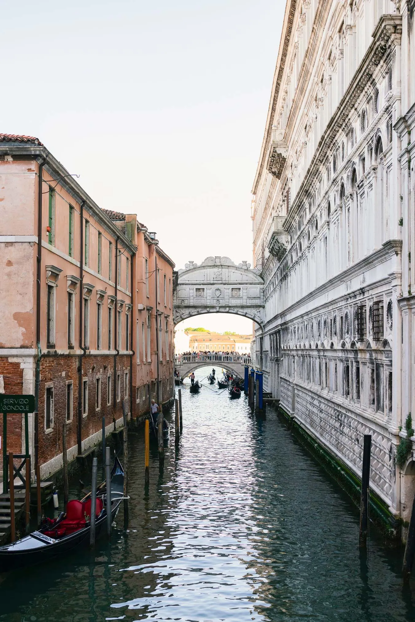 Lesbian proposal in Venice under the Bridge of Sighs in a gondola at sunset
