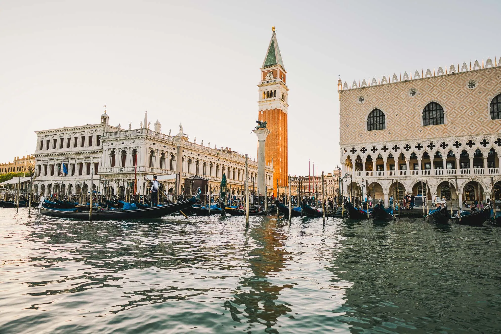 Lesbian proposal in Venice under the Bridge of Sighs in a gondola at sunset