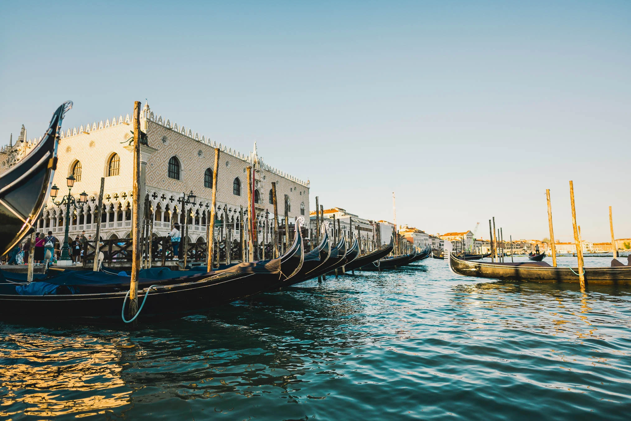 Lesbian proposal in Venice under the Bridge of Sighs in a gondola at sunset