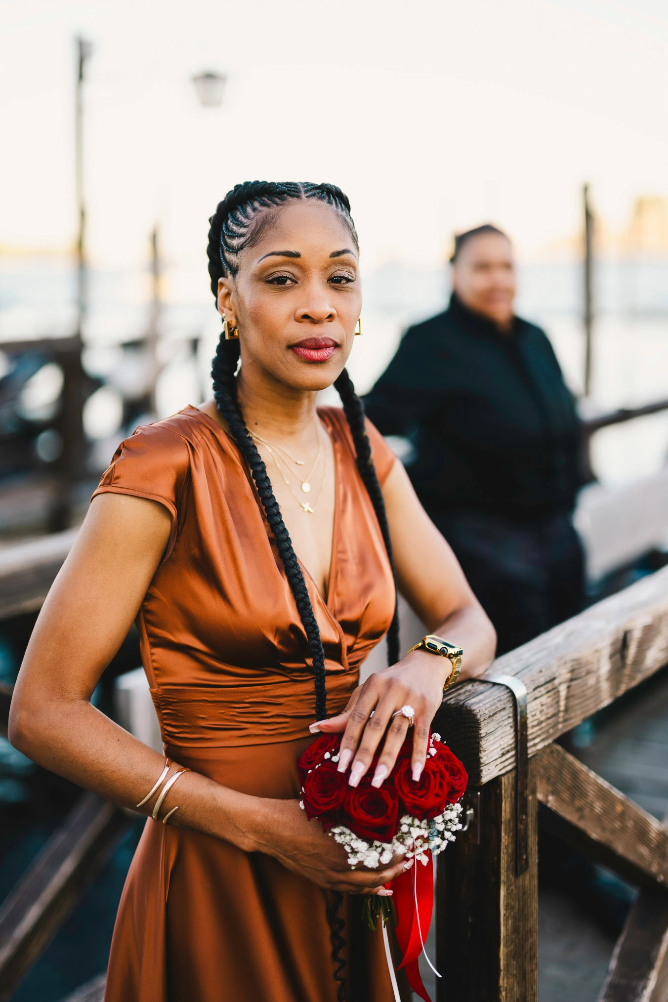 Lesbian couple walking along Riva dei Schiavoni with Grand Canal view in Venice