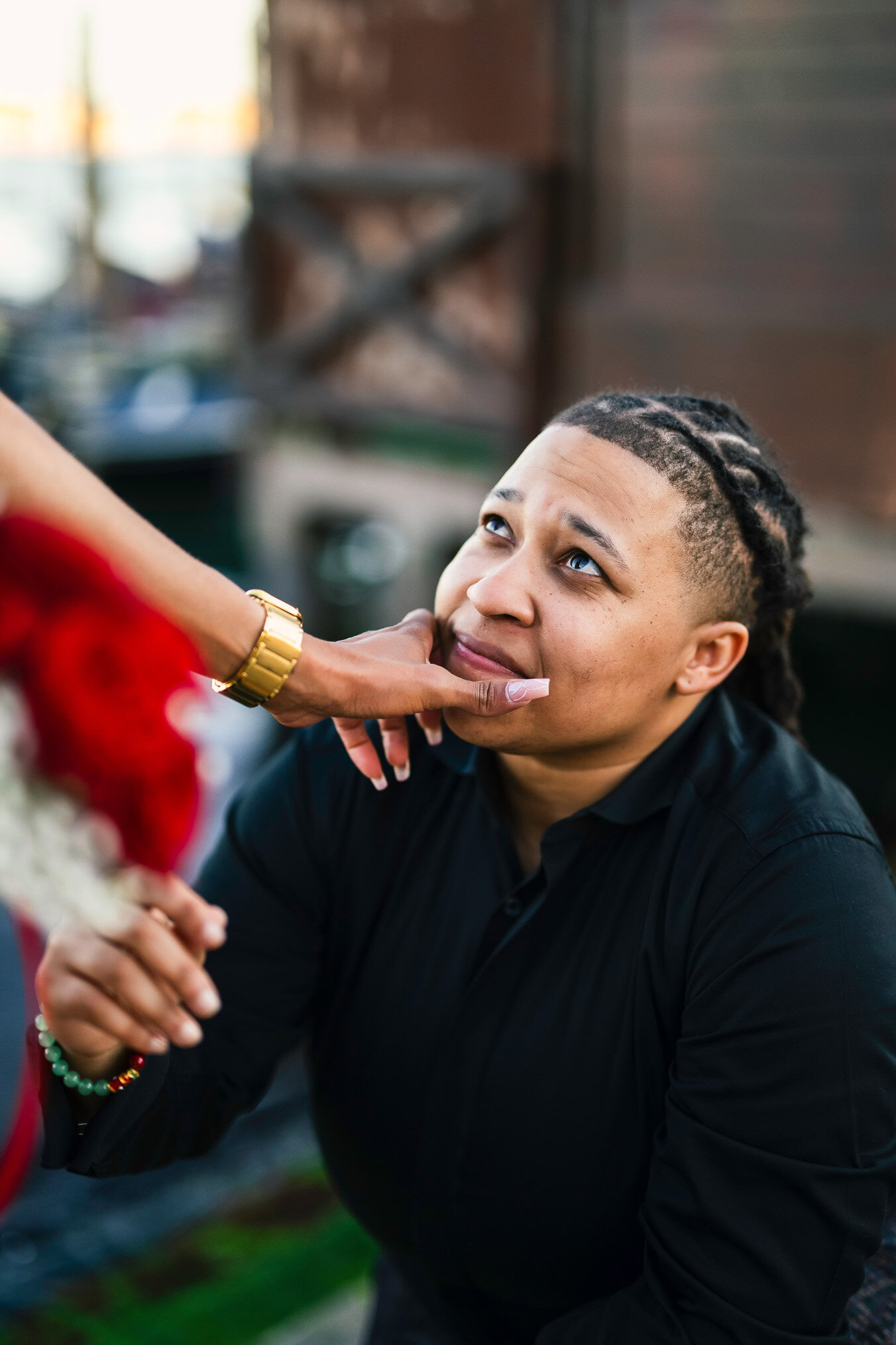 Lesbian couple walking along Riva dei Schiavoni with Grand Canal view in Venice