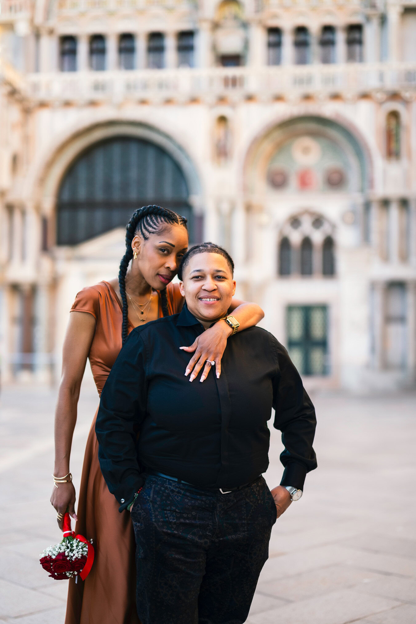 Lesbian couple proposal in Venice at San Marco Square at sunset