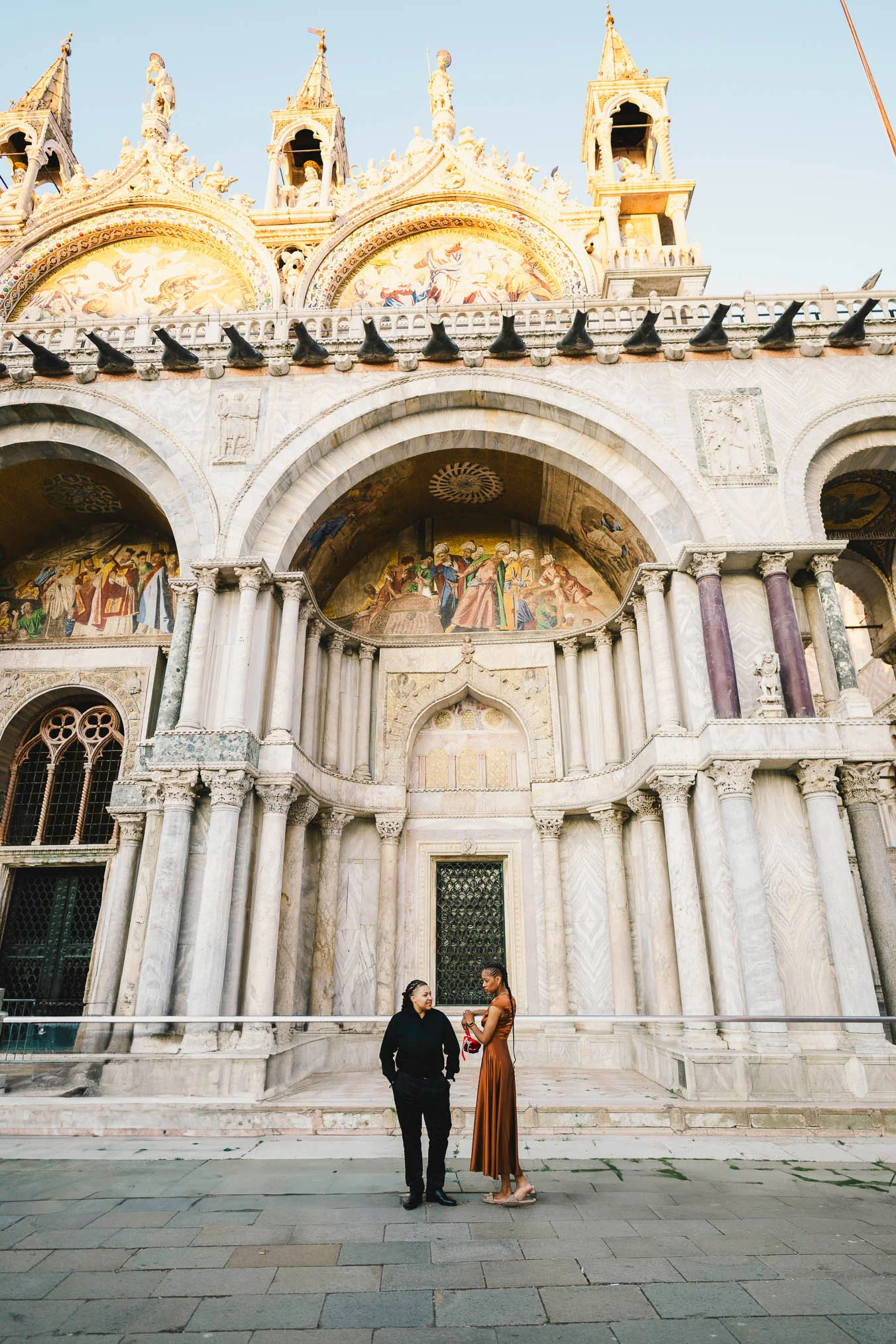 Lesbian couple proposal in Venice at San Marco Square at sunset