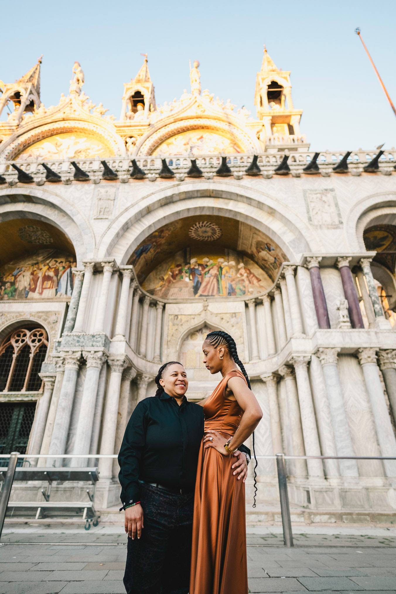 Lesbian couple proposal in Venice at San Marco Square at sunset