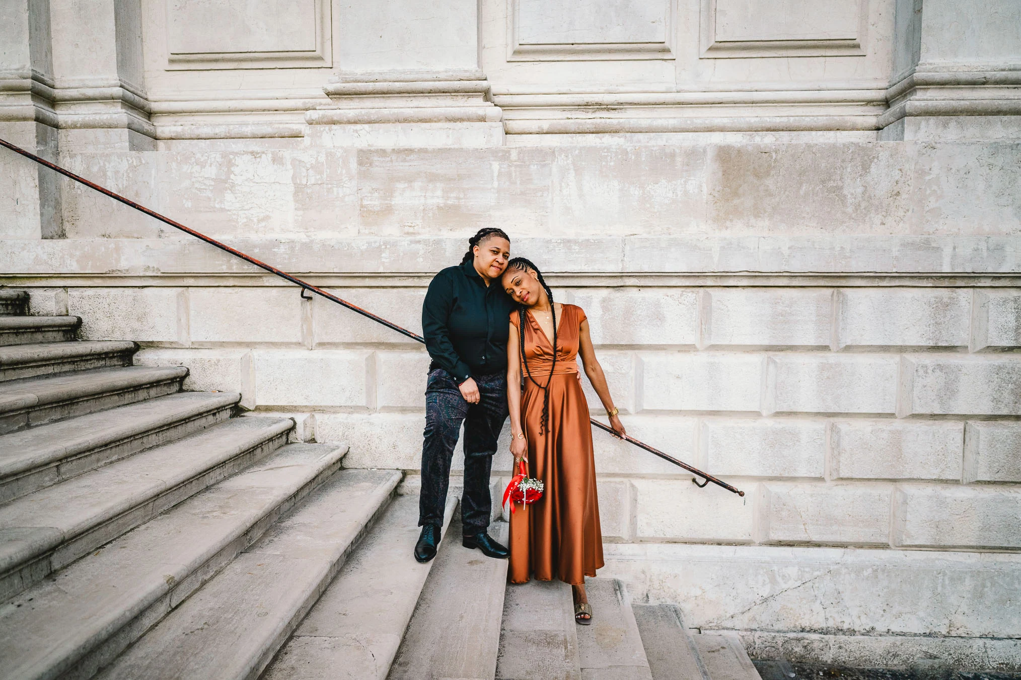 Lesbian couple in front of Santa Maria della Salute during their proposal in Venice