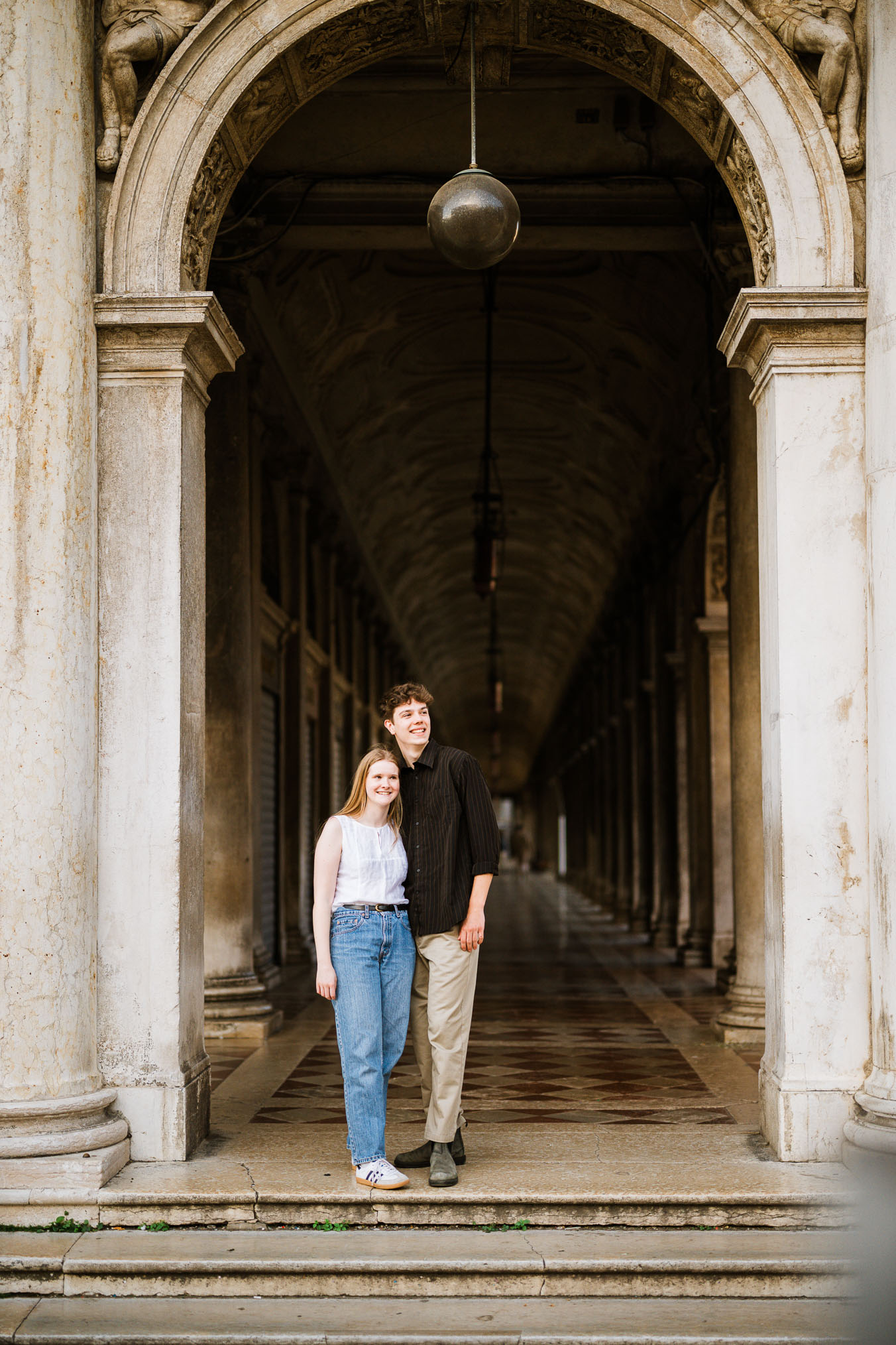 Venice surprise proposal final photos under San Marco arcades