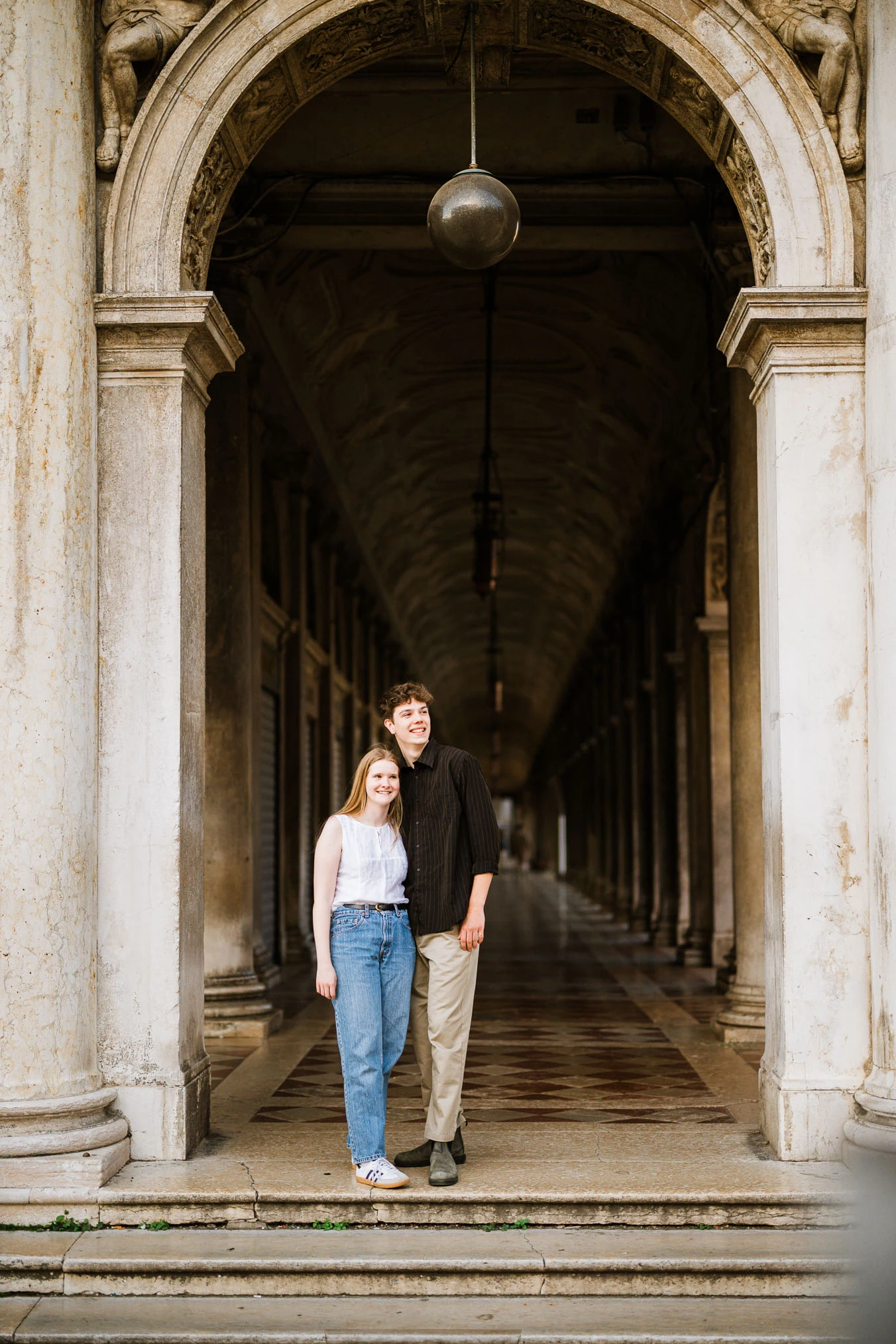 Venice surprise proposal final photos under San Marco arcades