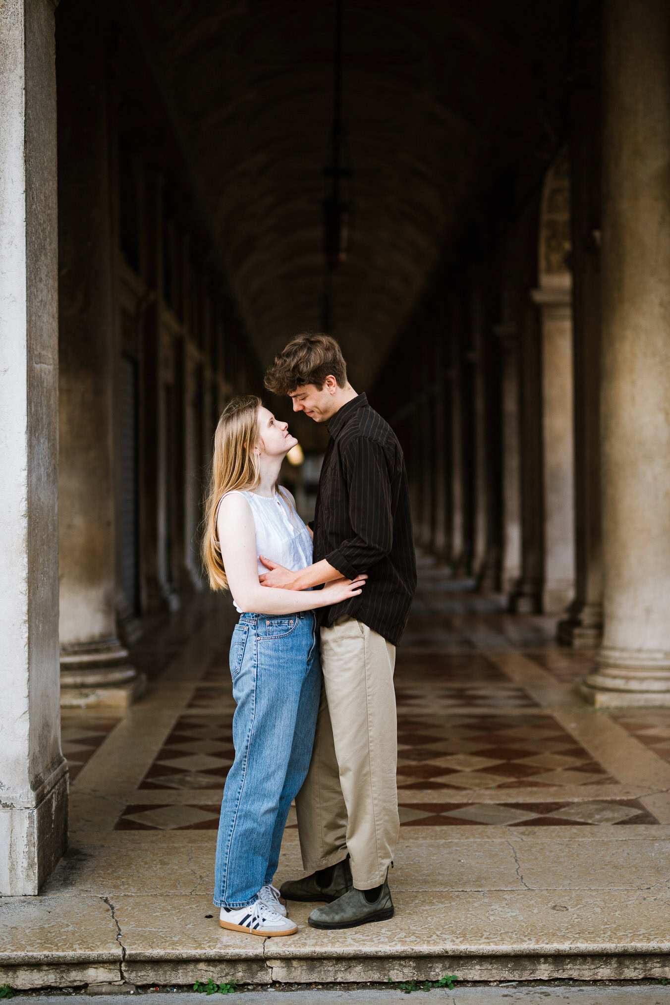 Venice surprise proposal final photos under San Marco arcades