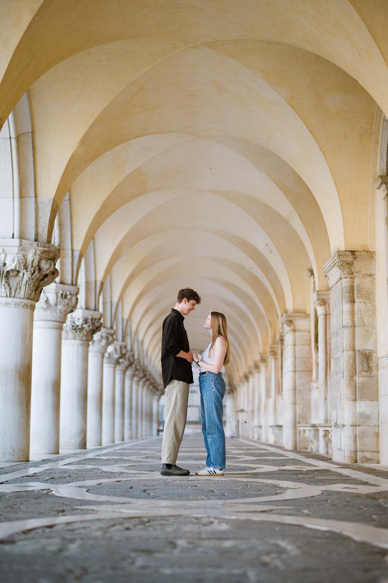 Venice surprise proposal final photos under San Marco arcades
