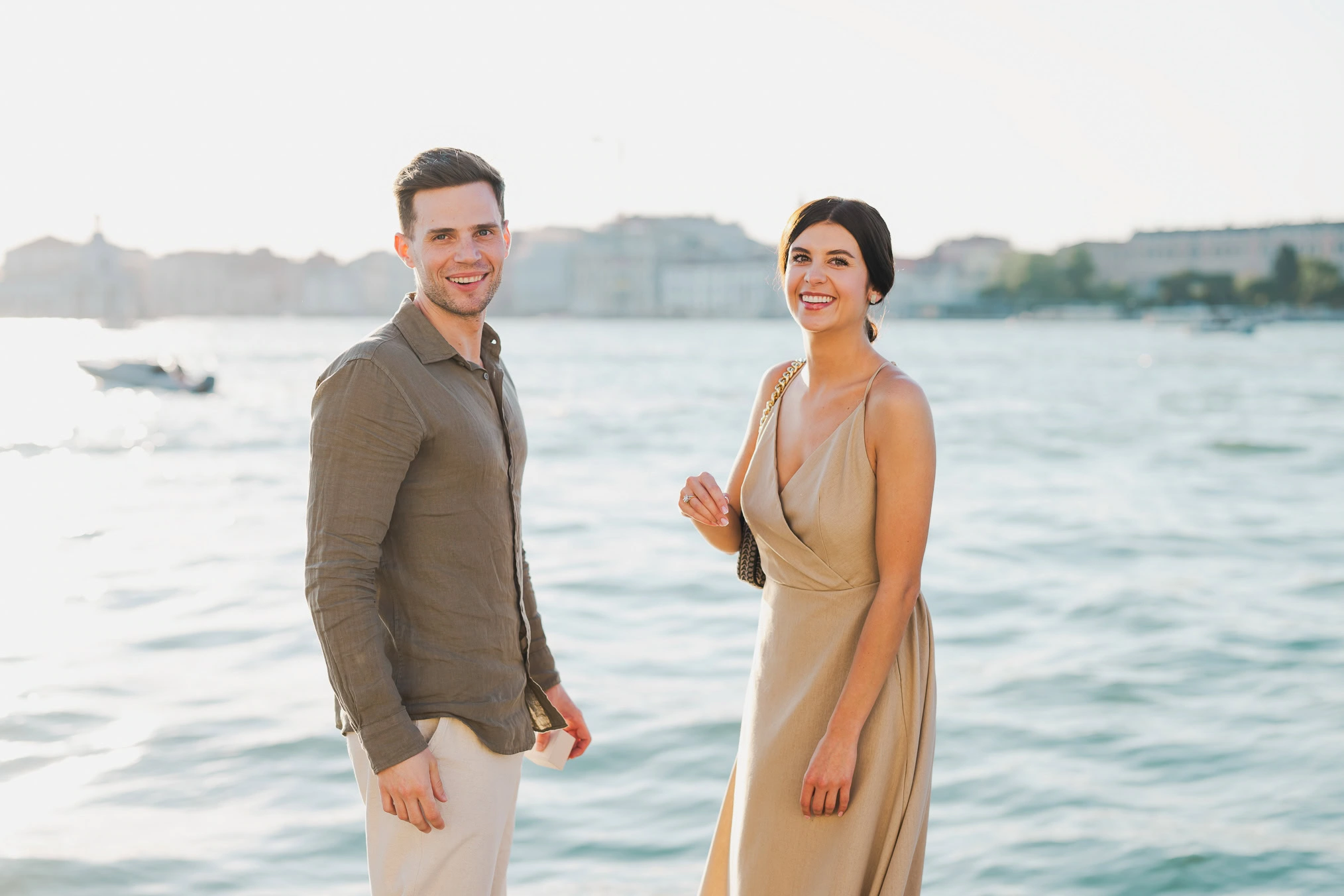Man proposing to his girlfriend at sunset on San Giorgio Maggiore island