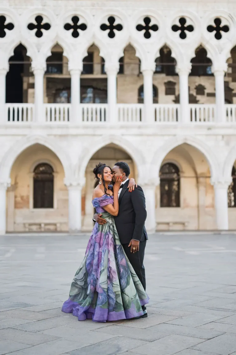 Romantic couple in elegant attire at Venice landmark, Venice wedding photoshoot, proposal, engagement photographer.