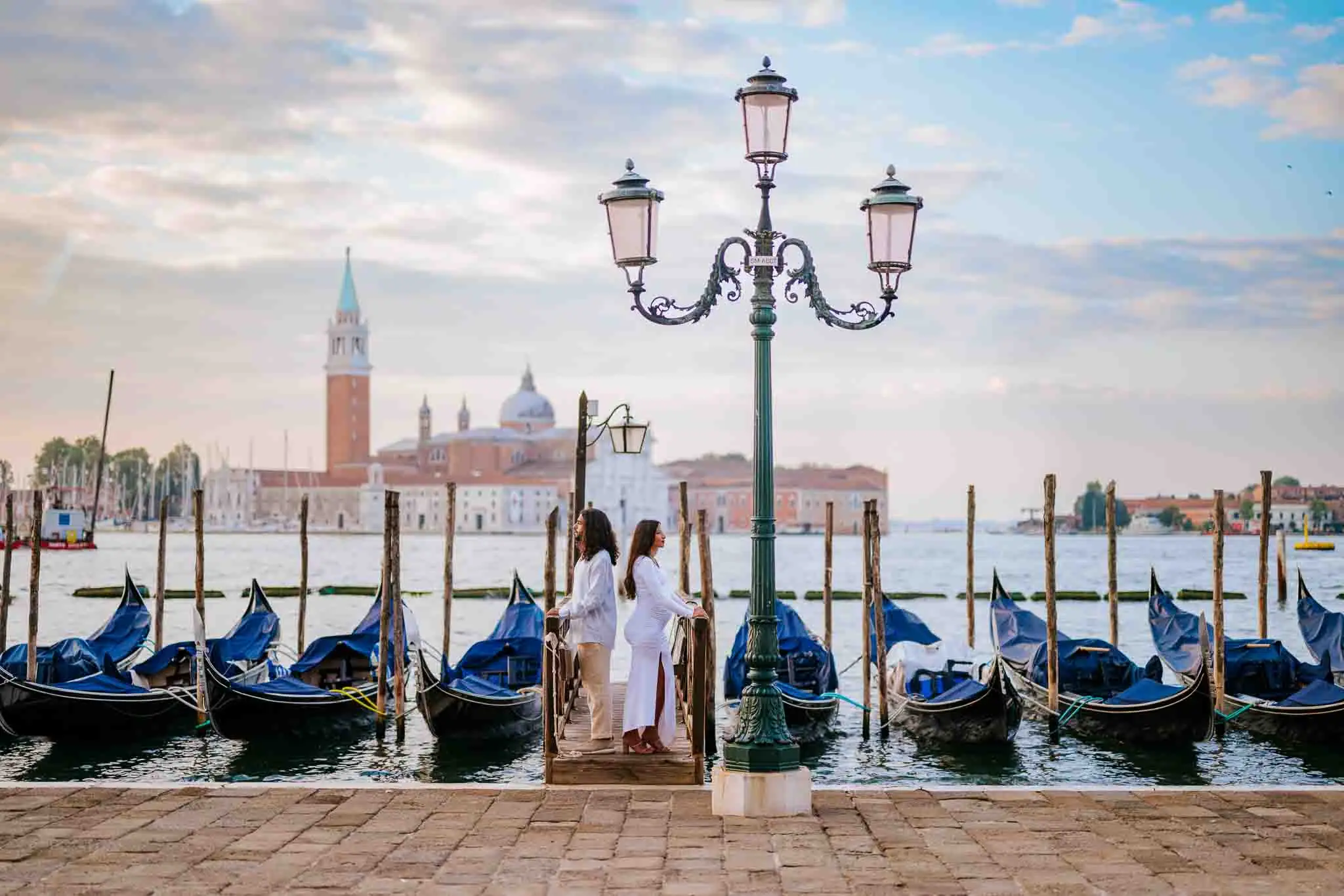 Gondola ride in Venice for wedding, engagement, and proposal photography.