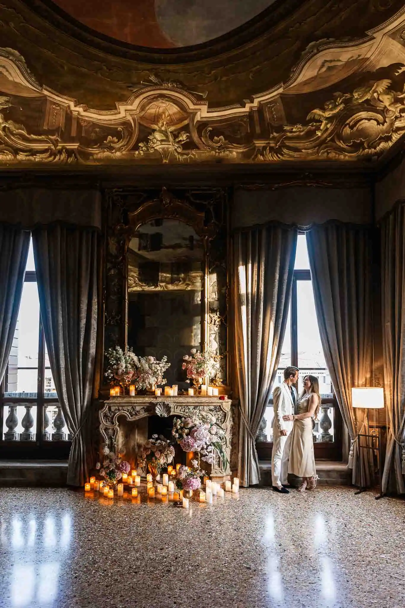 Romantic setting with candles and flowers.