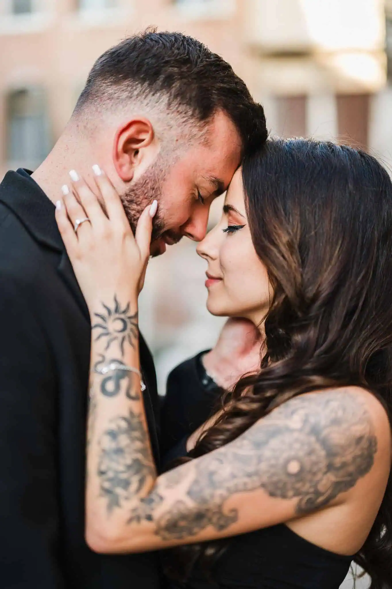 1. Intimate couple moment in Venice, with close embrace and tender expressions.