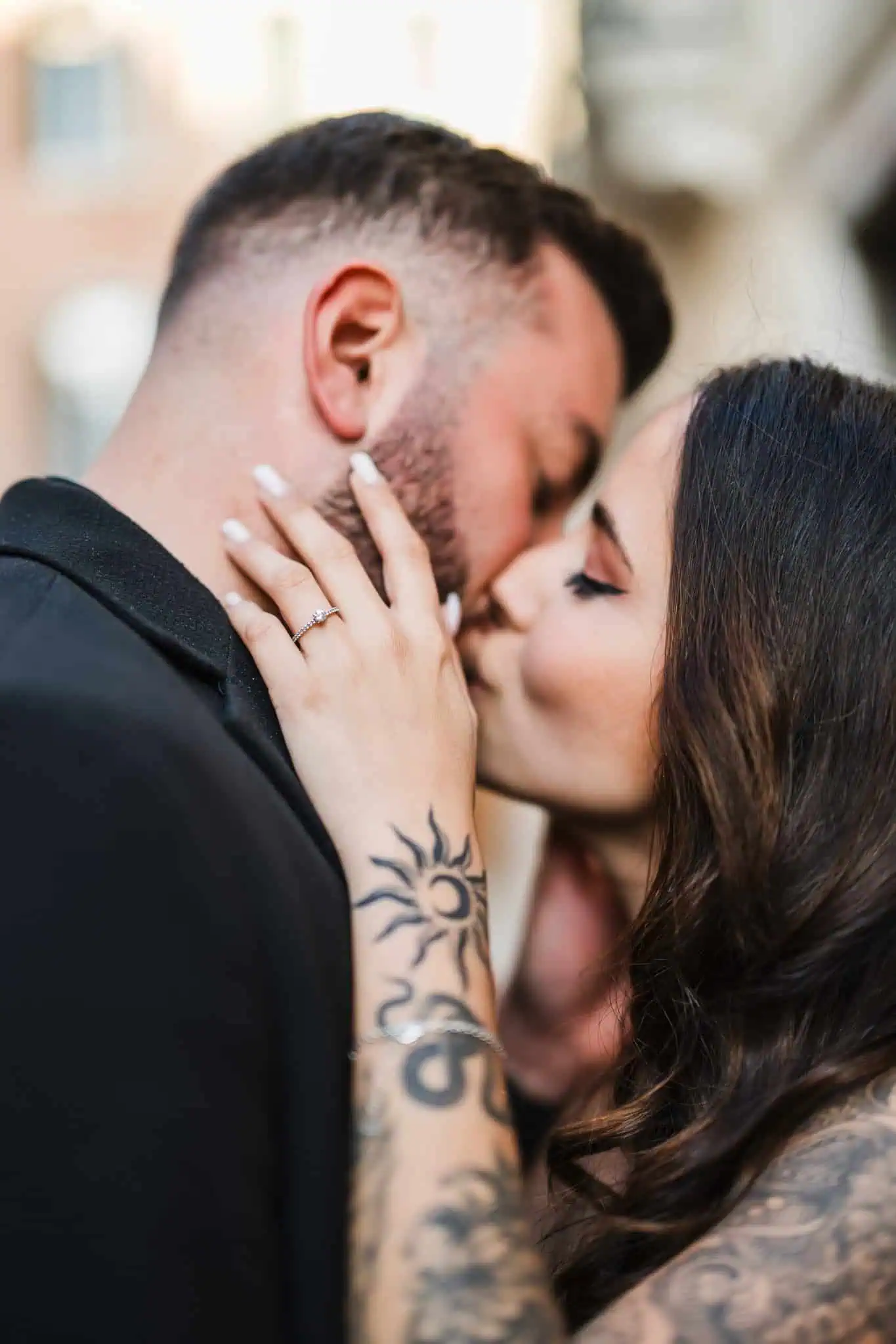 1. Intimate couple's kiss in Venice, capturing love and romance for engagement photos.