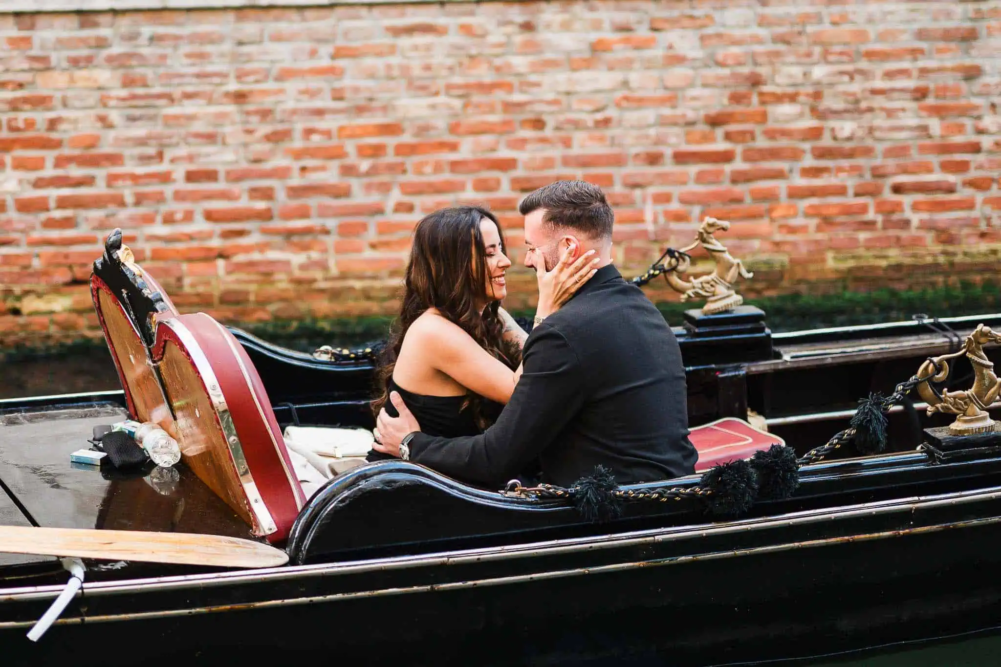 Elope couple on gondola in Venice, romantic proposal, wedding, love story, engagement photography.