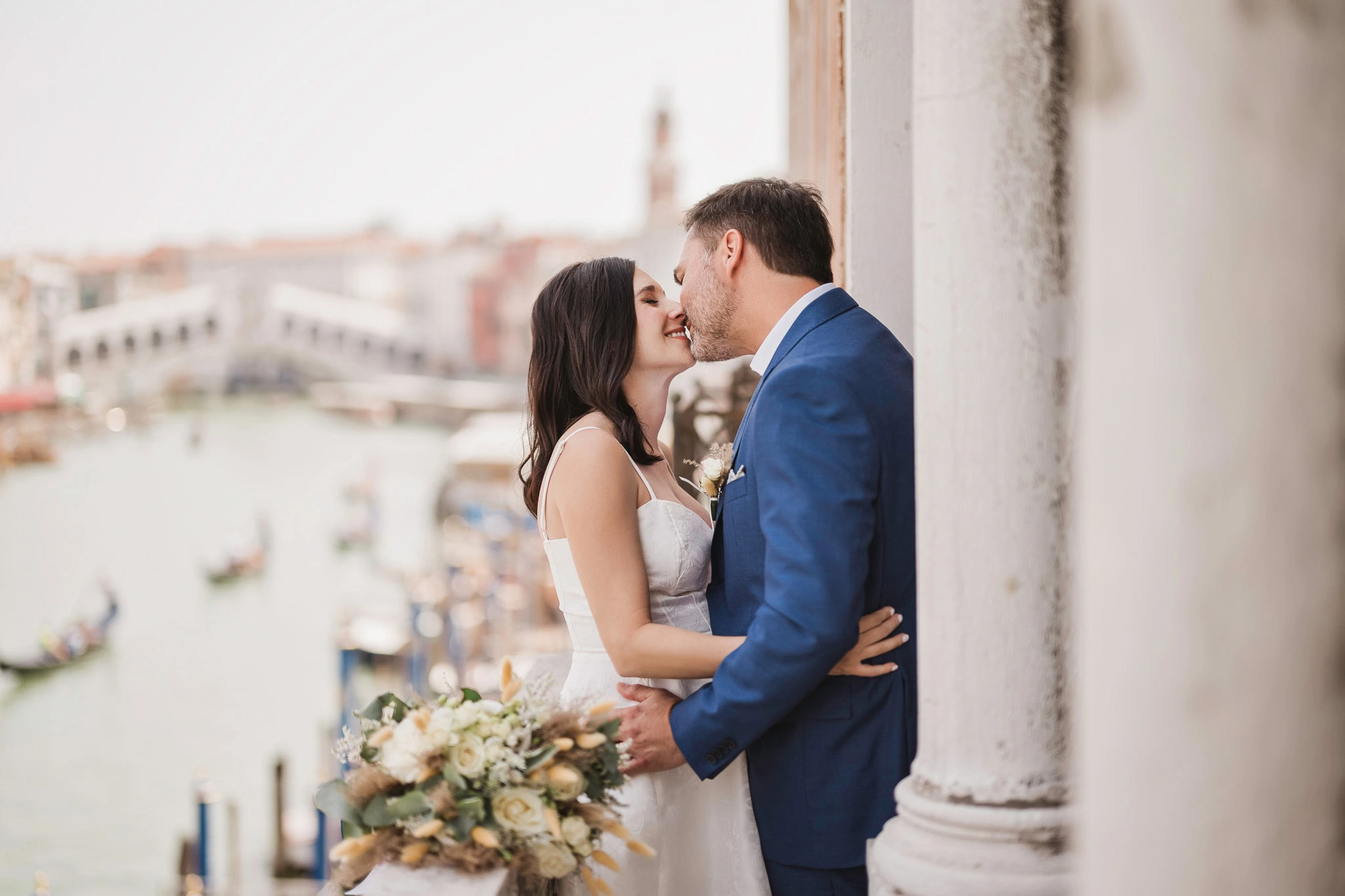 intimate elopement photography in Venice under historic columns
