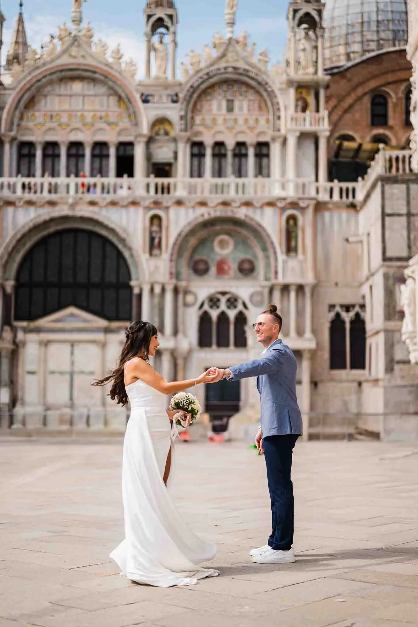 intimate elopement photography in Venice in front of a historic church